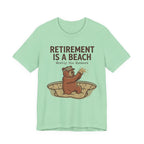 Retirement Is A Beach Golf T-Shirt | Mostly The Bunkers | Funny Retirement Golf Tee | Wild Green Golf